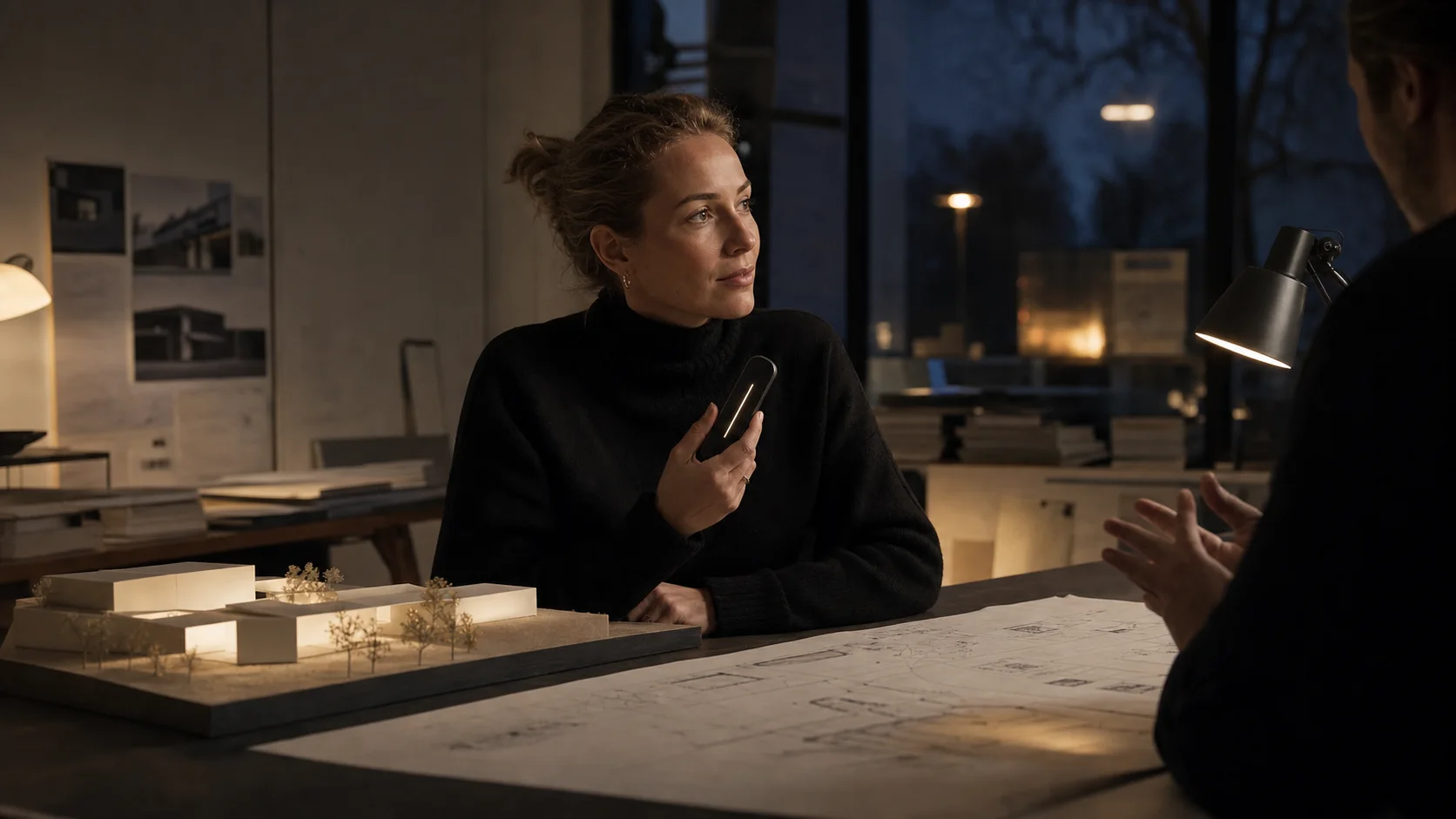A private briefing in a quiet architecture studio